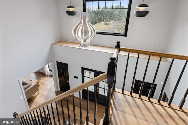 staircase featuring hardwood / wood-style flooring