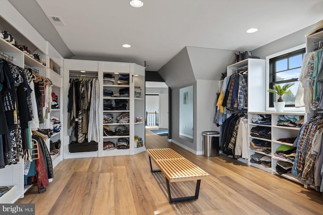 walk in closet featuring light hardwood / wood-style floors