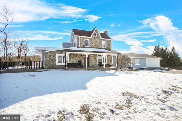 front of property featuring covered porch