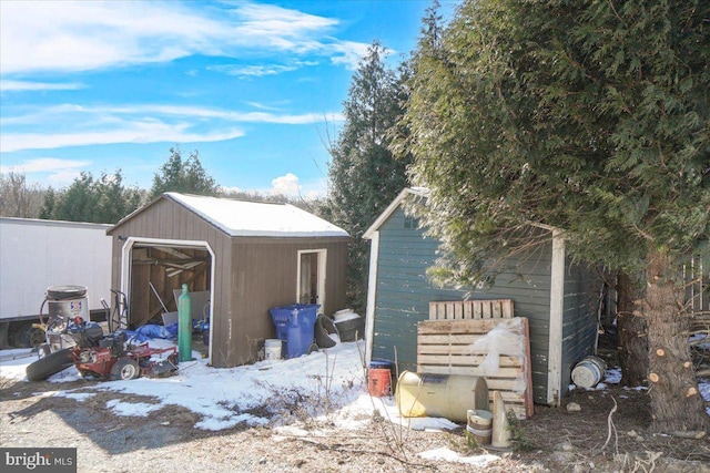 view of snow covered garage