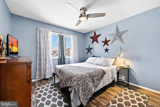 bedroom featuring ceiling fan and wood-type flooring