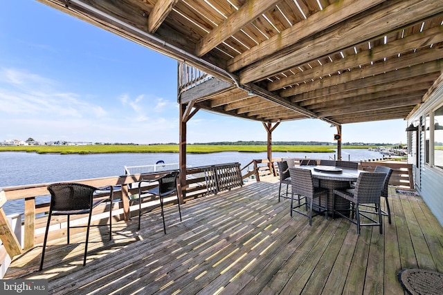 dock area with a deck with water view