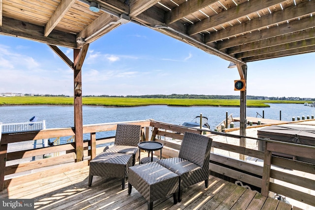 dock area featuring a water view