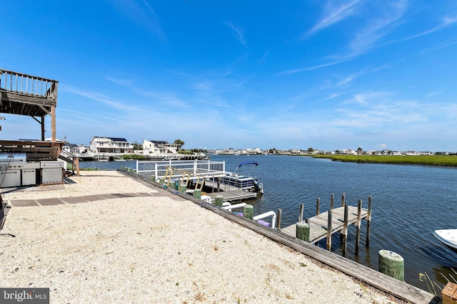 dock area featuring a water view