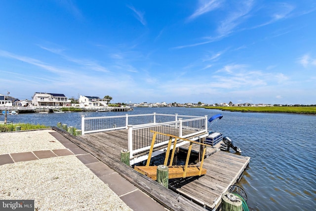 view of dock featuring a water view