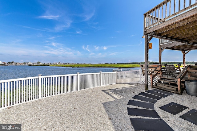 exterior space with a water view