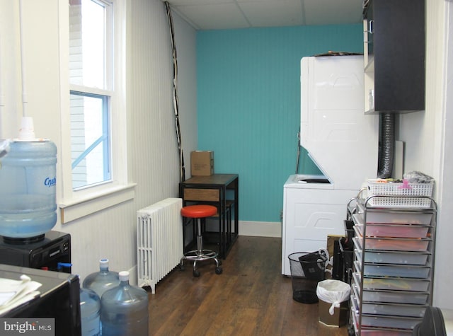 washroom featuring radiator and dark hardwood / wood-style floors