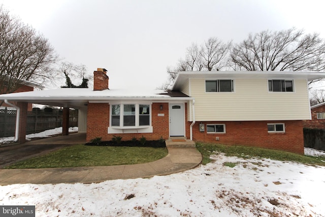 split level home with a carport