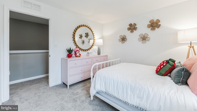 bedroom with light carpet