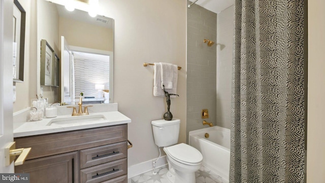 full bathroom with toilet, vanity, and shower / bathtub combination with curtain