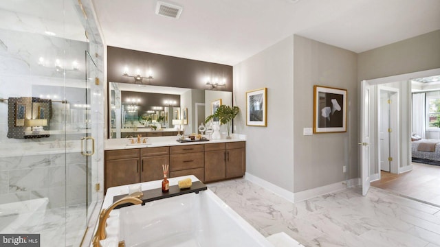 bathroom featuring walk in shower and vanity