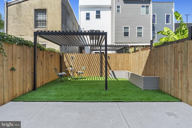 view of yard featuring a patio area and a pergola