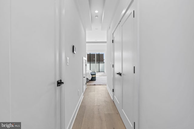 hallway featuring light wood-type flooring