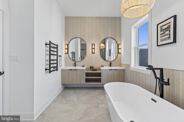 bathroom featuring a bathtub and vanity