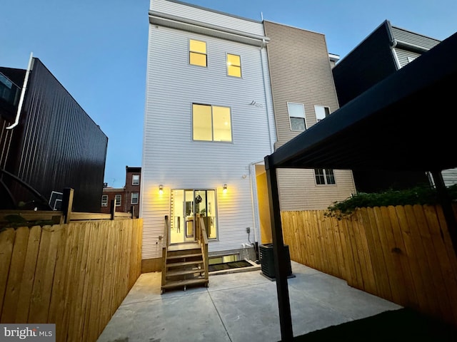 rear view of house with a patio area