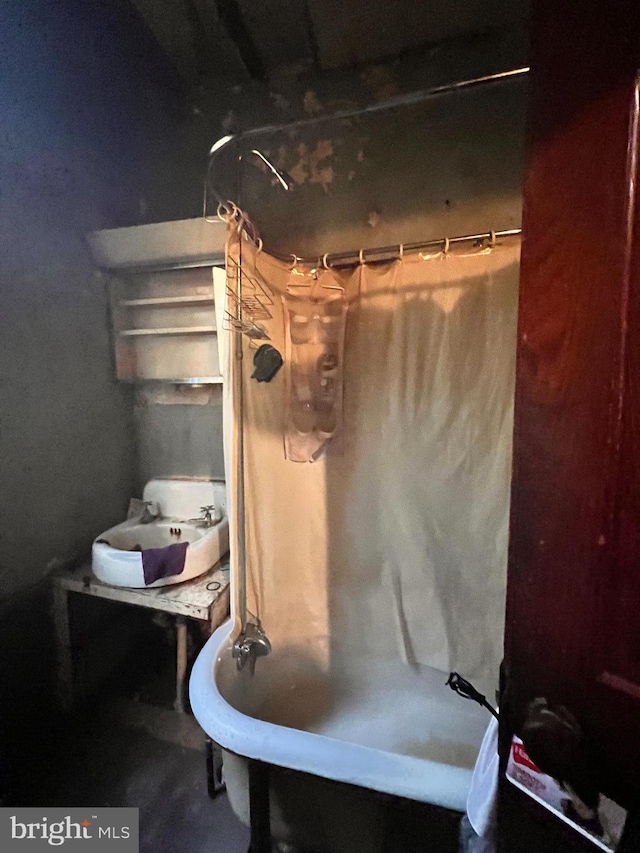 bathroom featuring a tub to relax in