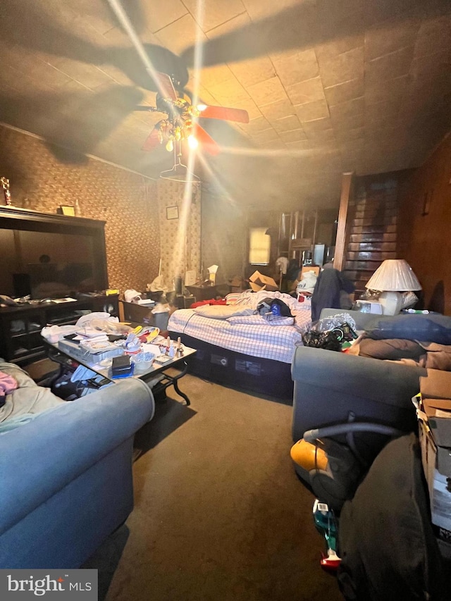 bedroom featuring ceiling fan and carpet flooring