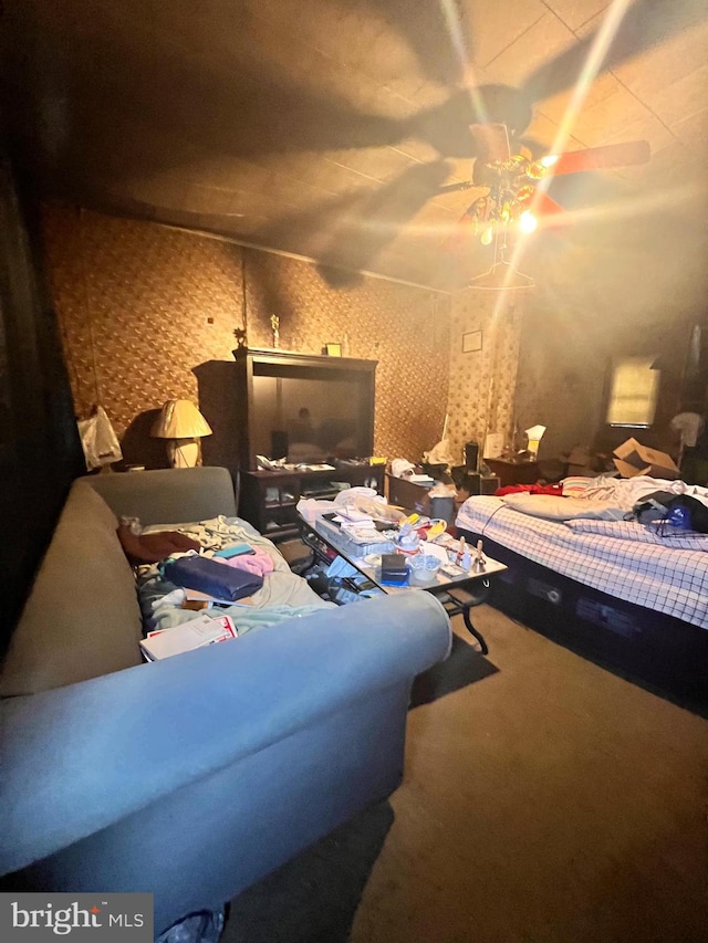 bedroom featuring ceiling fan and carpet floors