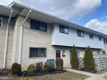 view of front of house featuring central air condition unit