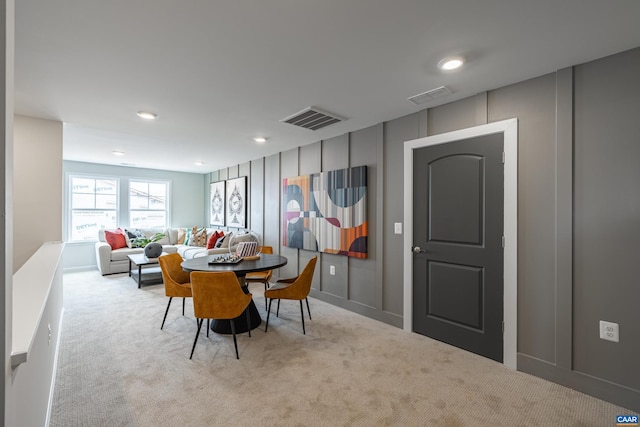 view of carpeted dining space