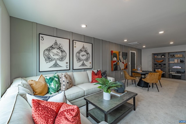 living room with light colored carpet