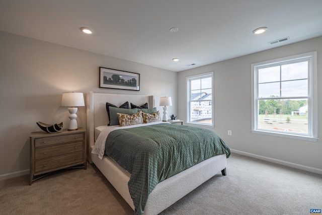 bedroom featuring carpet