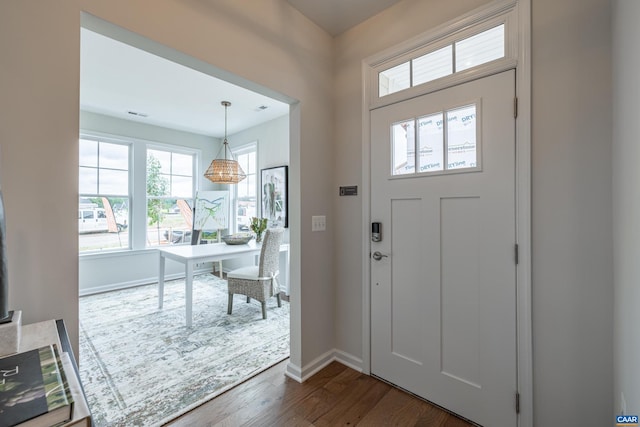 foyer featuring dark hardwood / wood-style floors