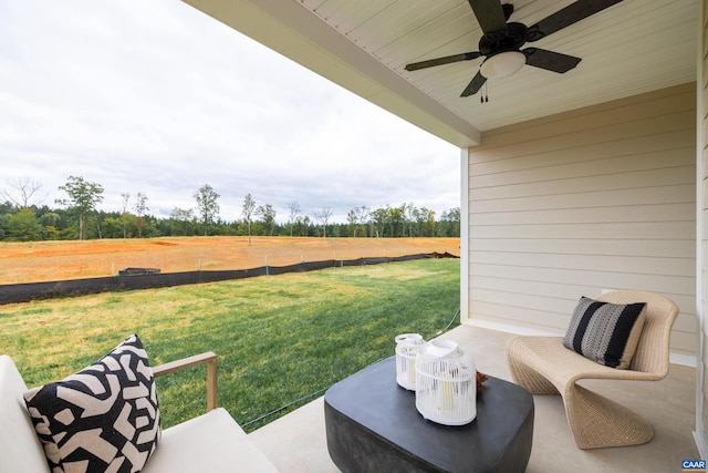 view of yard featuring ceiling fan