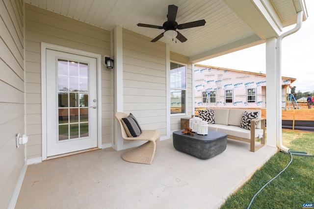 view of patio featuring ceiling fan and outdoor lounge area