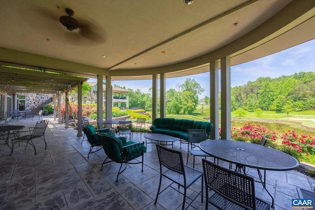 view of patio with an outdoor hangout area and ceiling fan