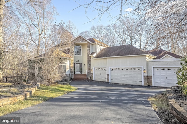 front of property with a garage