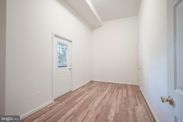 spare room featuring light hardwood / wood-style floors