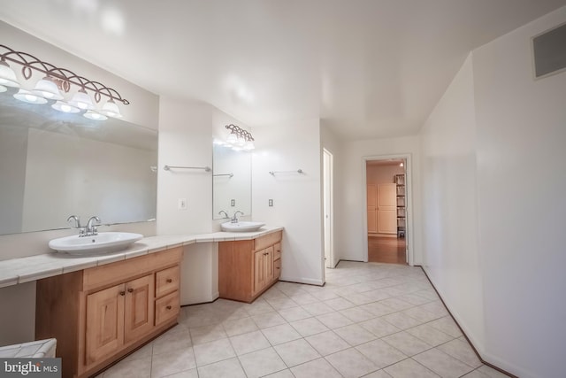 bathroom featuring vanity and tile patterned floors