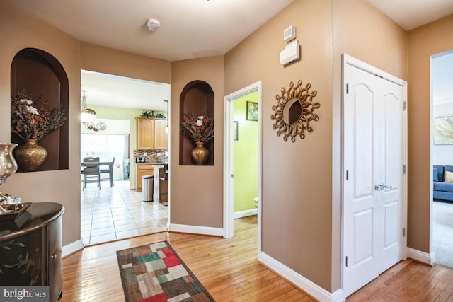 hall featuring light hardwood / wood-style floors