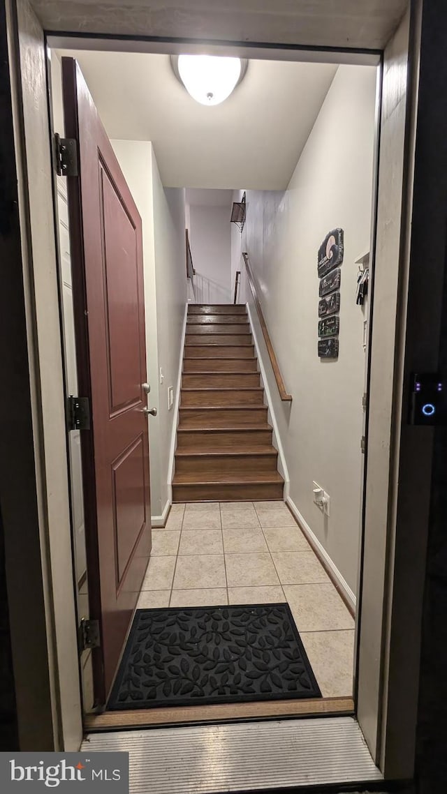 interior space featuring light tile patterned flooring