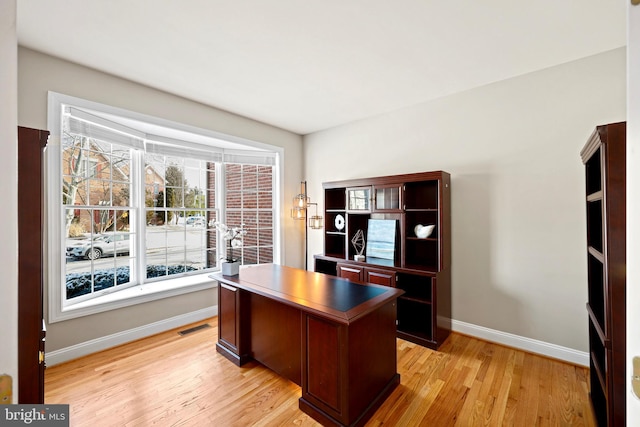 home office featuring light wood-type flooring