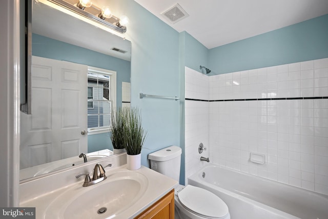 full bathroom with vanity, toilet, and tub / shower combination