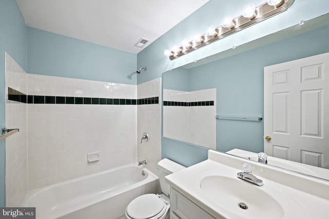 full bathroom featuring  shower combination, toilet, and vanity