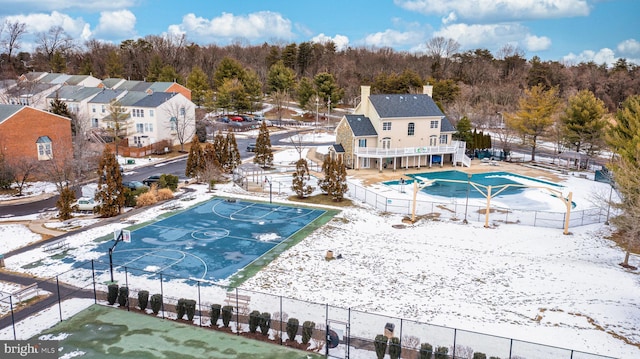 view of snow covered pool