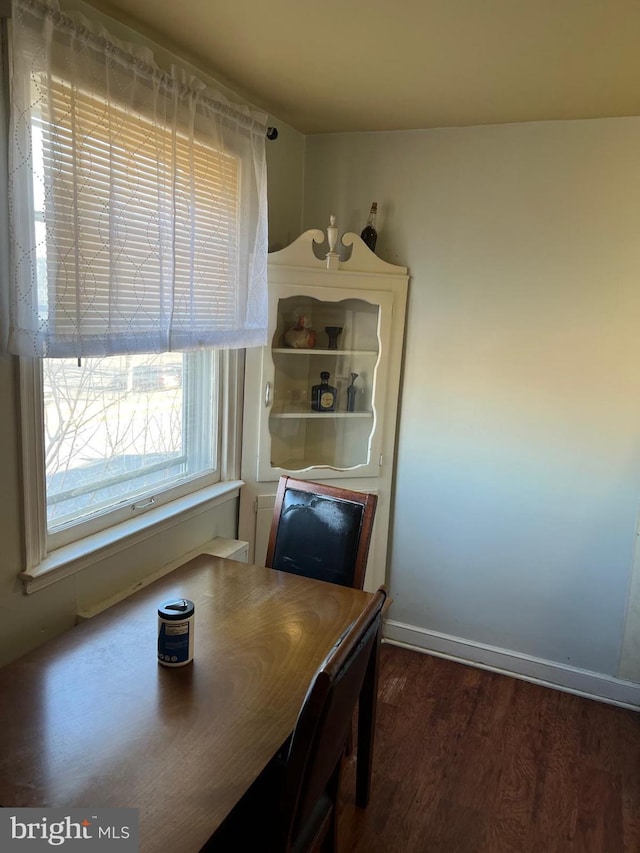 unfurnished dining area with hardwood / wood-style floors