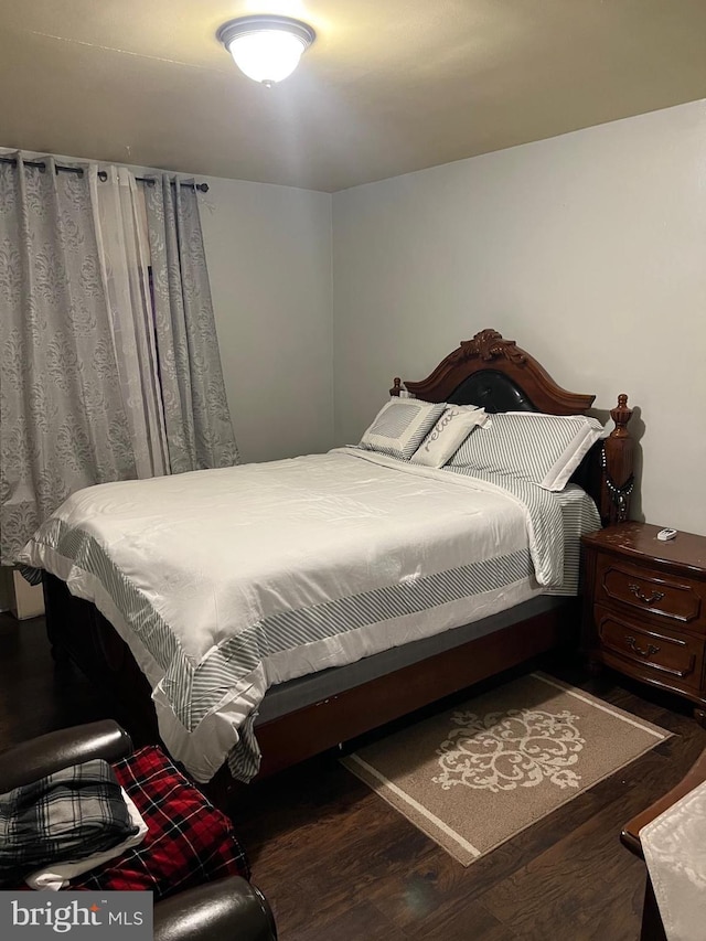 bedroom featuring hardwood / wood-style floors