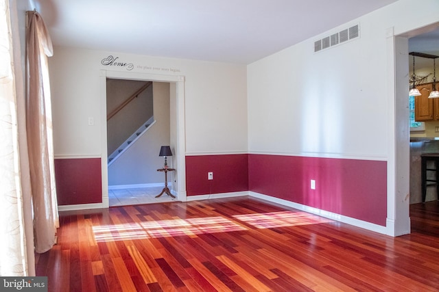 empty room featuring hardwood / wood-style floors