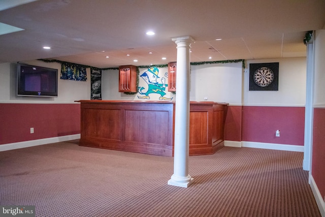 bar featuring carpet and decorative columns