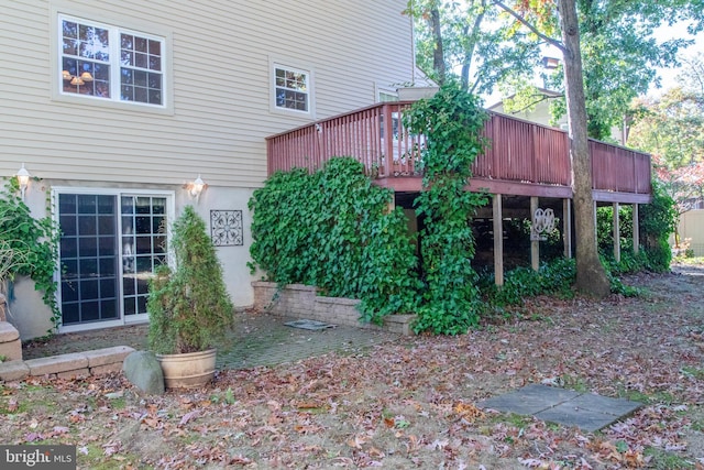 exterior space featuring a wooden deck