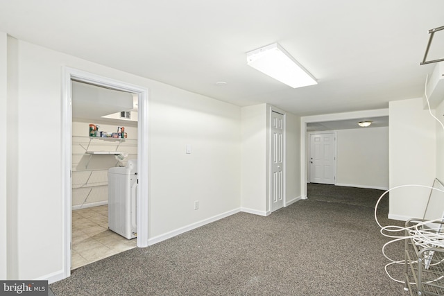 interior space with washer and clothes dryer and carpet floors