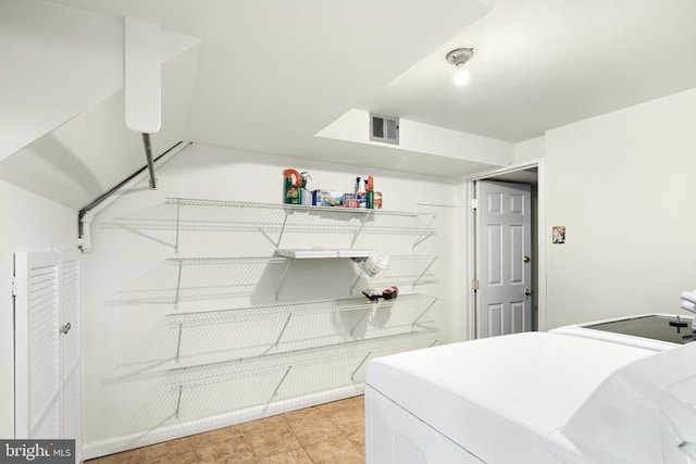 laundry area featuring independent washer and dryer