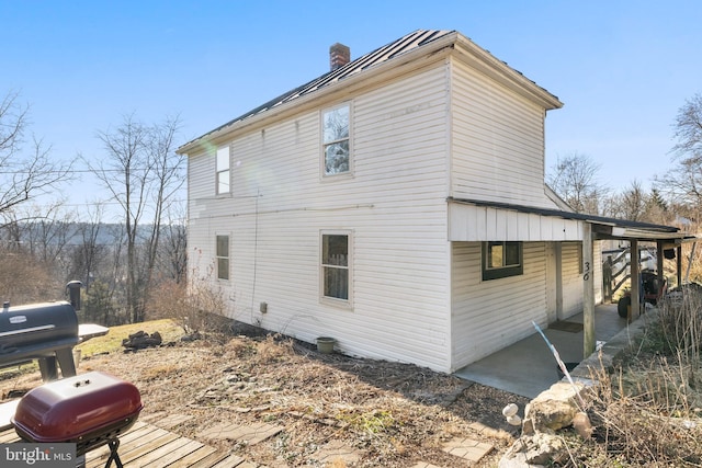 view of home's exterior featuring a patio area