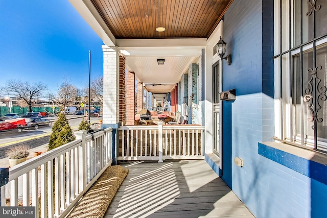 balcony featuring covered porch