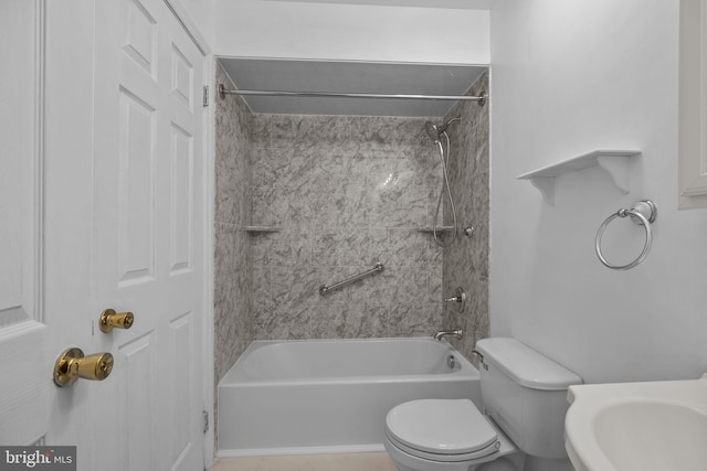 bathroom with shower / bathtub combination and toilet