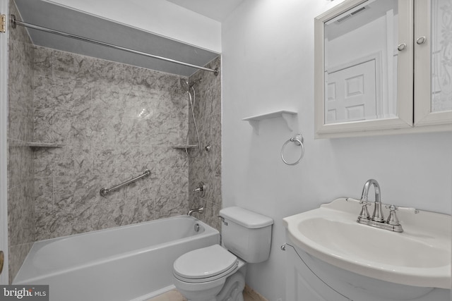 full bathroom with sink, toilet, and  shower combination